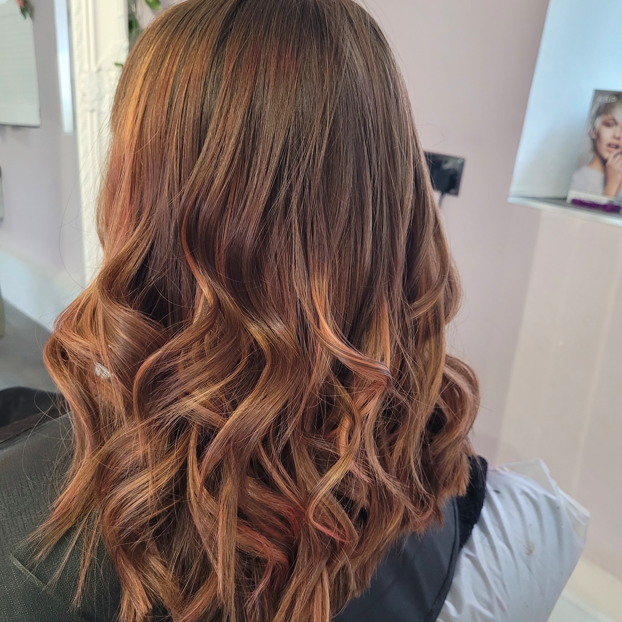 Copper auburn colour, curled
